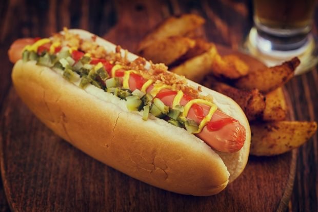 Hot dog with pickles and crispy onions is a simple and delicious recipe for cooking step by step