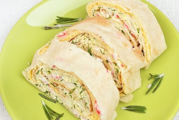 Pita bread roll with crab sticks, cheese and garlic is a simple and delicious recipe how to cook step by step