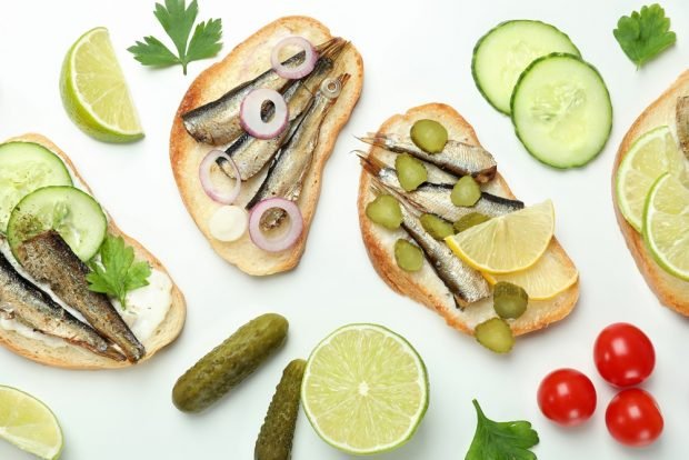 Sandwiches with sprats and pickled cucumber on a loaf – a simple and delicious recipe, how to cook step by step