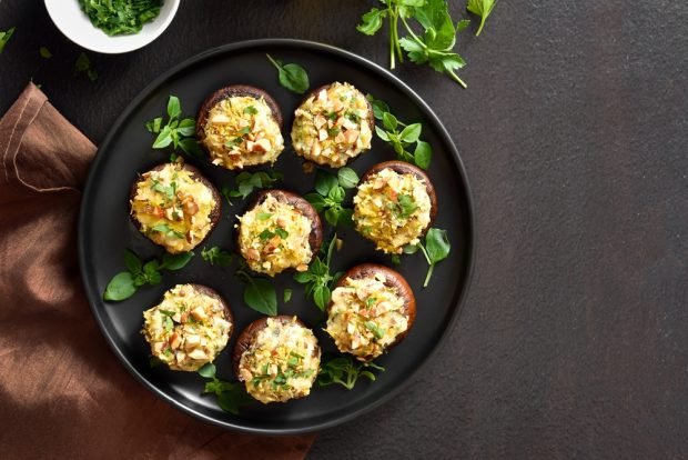 Stuffed mushrooms with cheese is a simple and delicious recipe how to cook step by step