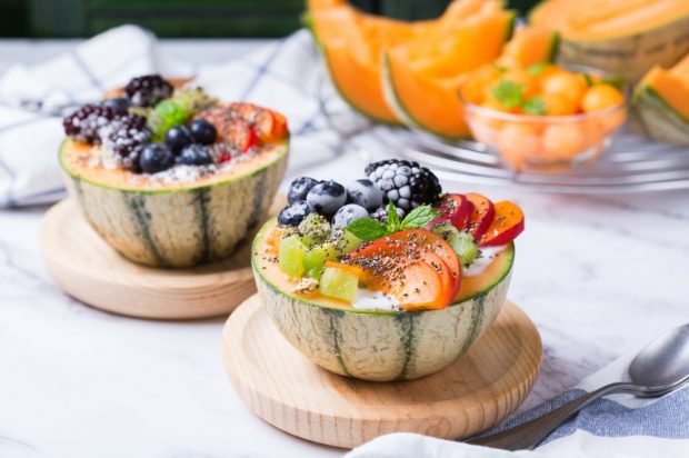 Fruit salad with yogurt in melon is a simple and delicious recipe how to cook step by step