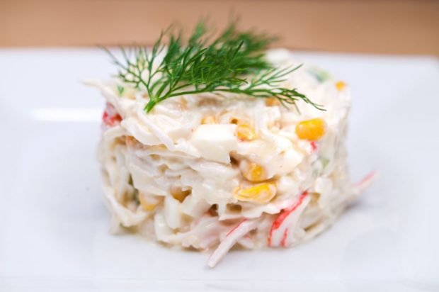 Salad of crab sticks, squid and processed cheese is a simple and delicious recipe, how to cook step by step