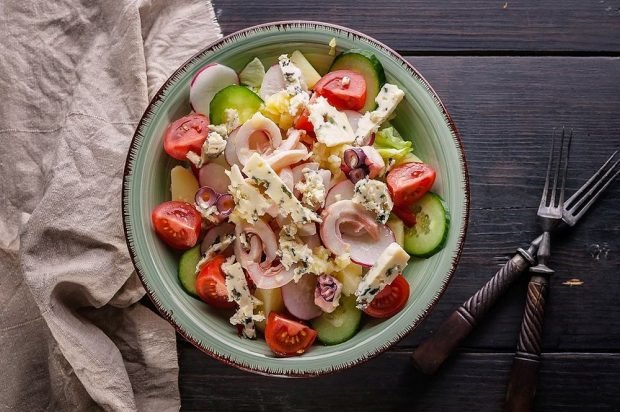 Seafood salad, cheese and fresh vegetables