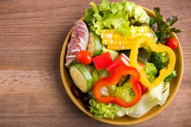 Salad bowl with vegetables and crab sticks is a simple and delicious recipe, how to cook step by step