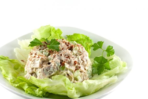 Salad with chicken, cucumbers and pickled mushrooms