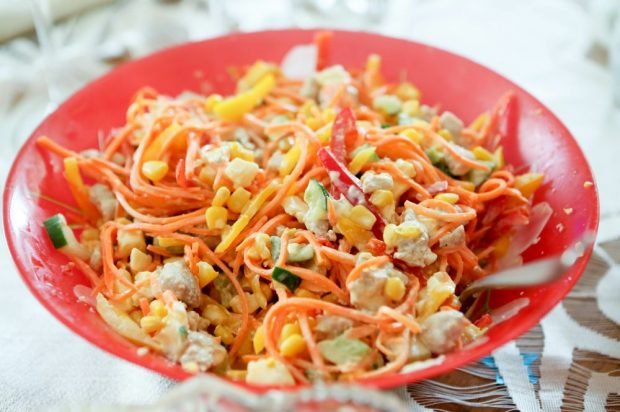 Salad of chicken, Korean carrots and fresh vegetables