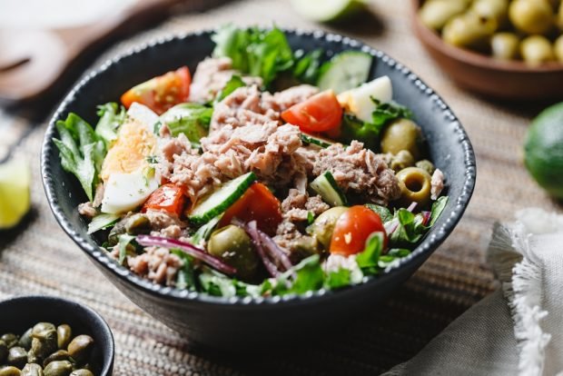 Salad with vegetables and canned fish is a simple and delicious recipe how to cook step by step