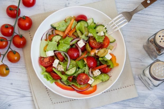 Greek salad with cherry tomatoes, feta and soy sauce