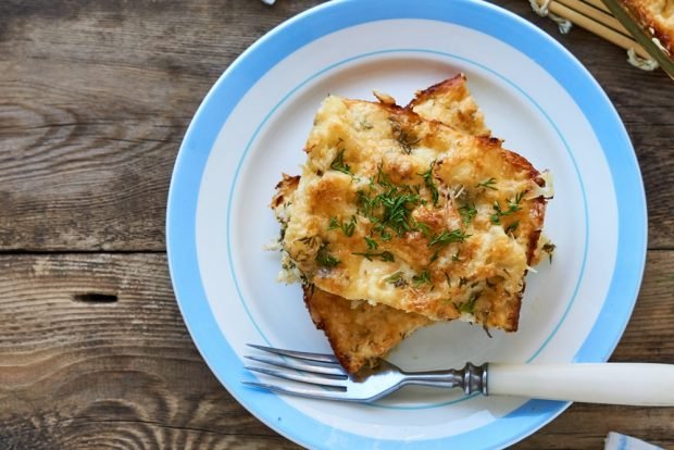 Cauliflower casserole with cheese in a slow cooker 