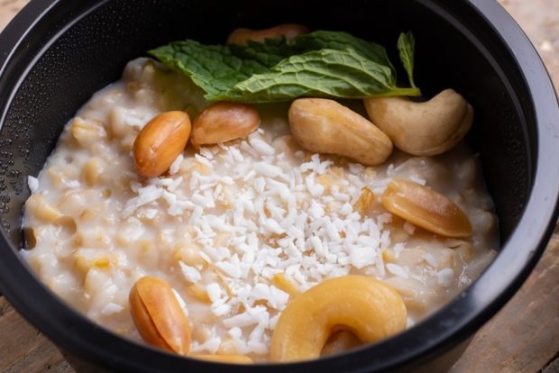 Wheat porridge with nuts and coconut chips is a simple and delicious recipe, how to cook step by step