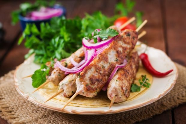 Turkey and pork kebab on the grill is a simple and delicious recipe how to cook step by step