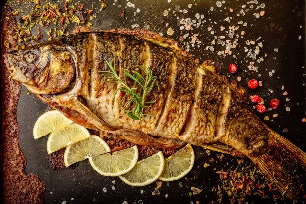 Baked carp with spices is a simple and delicious recipe how to cook step by step