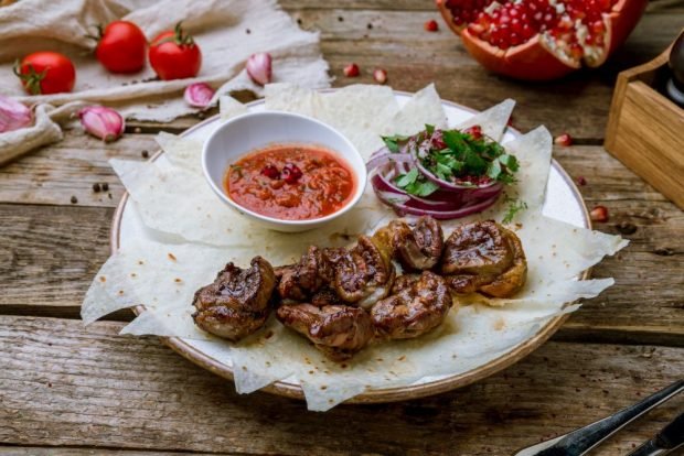 Beef kidney kebab on the grill 