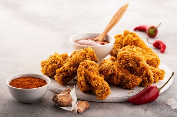 Spicy chicken wings baked in breadcrumbs from corn flakes – a simple and delicious recipe, how to cook step by step