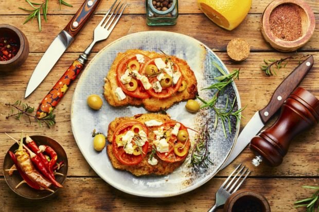 Pork chops with tomatoes, olives and feta in the oven is a simple and delicious recipe, how to cook step by step