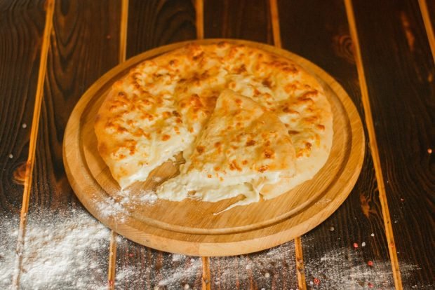 Khachapuri with Adyghe cheese and suluguni is a simple and delicious recipe for cooking step by step