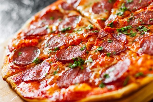 Pizza with salami is a simple and delicious recipe, how to cook step by step