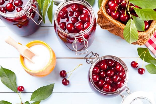 Canned cherry compote with sugar