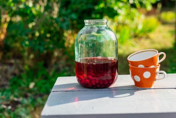 Cherry compote with herbs for winter 