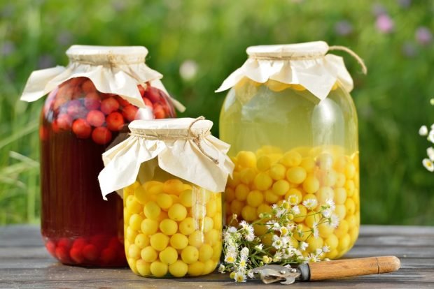 Canned compote from yellow cherries 