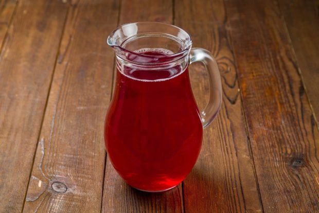 Compote of red cherry for winter