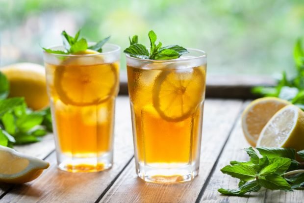 Mojito for winter with orange, lemon and mint