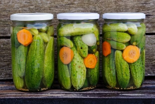 Pickled cucumbers with carrots and onions for winter – a simple and delicious recipe, how to cook step by step