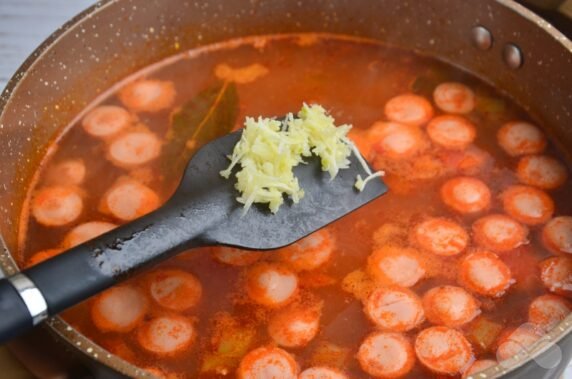 Homemade hodgepodge with chicken and sausages: photo of recipe preparation, step 8 Homemade hodgepodge with chicken and sausages: photo of recipe preparation, step 8