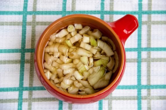 Herring under a fur coat with crab sticks: photo of recipe preparation, step 3